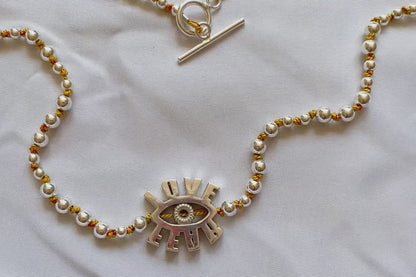 Spinning Eye Pendant with silver beads